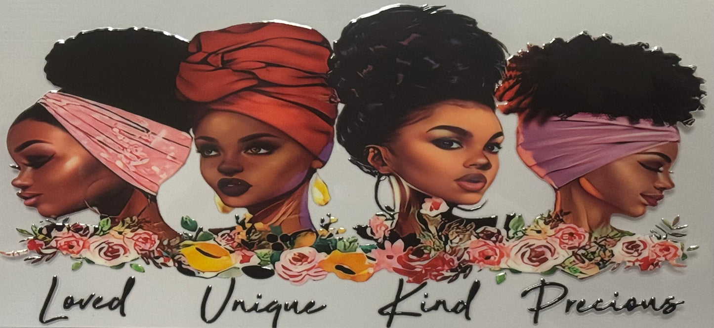 A wrap with four illustrated Black women with headwraps surrounded by flowers and the words “Loved, Unique, Kind, Precious.”
