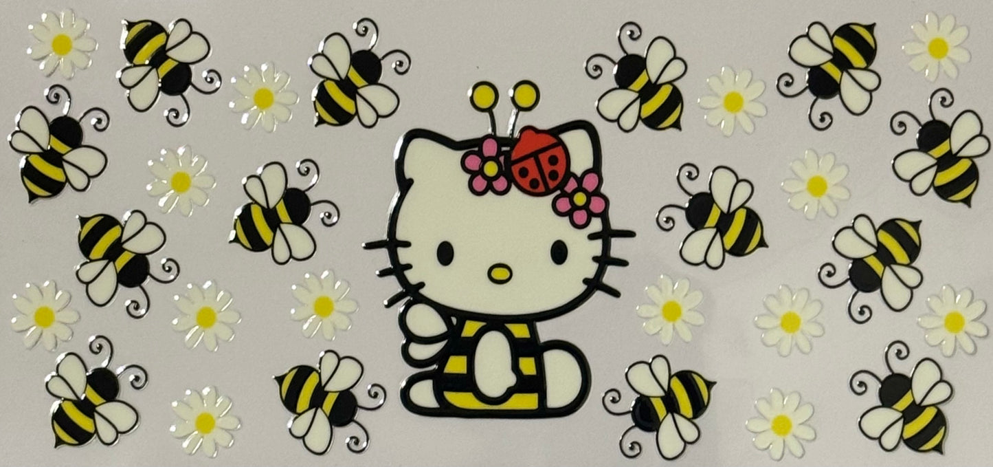 Hello Kitty in a bee outfit with bees, daisies, and a ladybug.