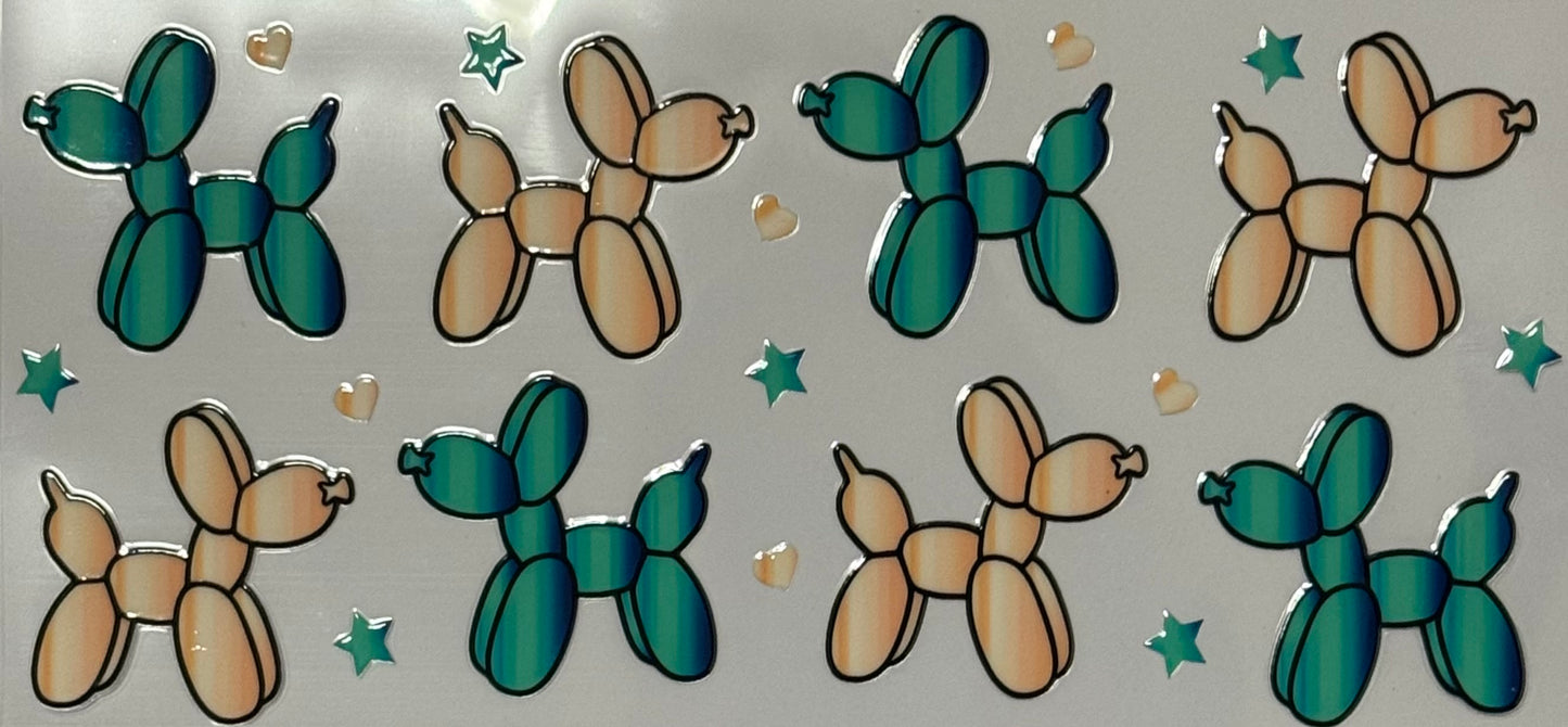 teal and beige balloon dog figures with stars and hearts