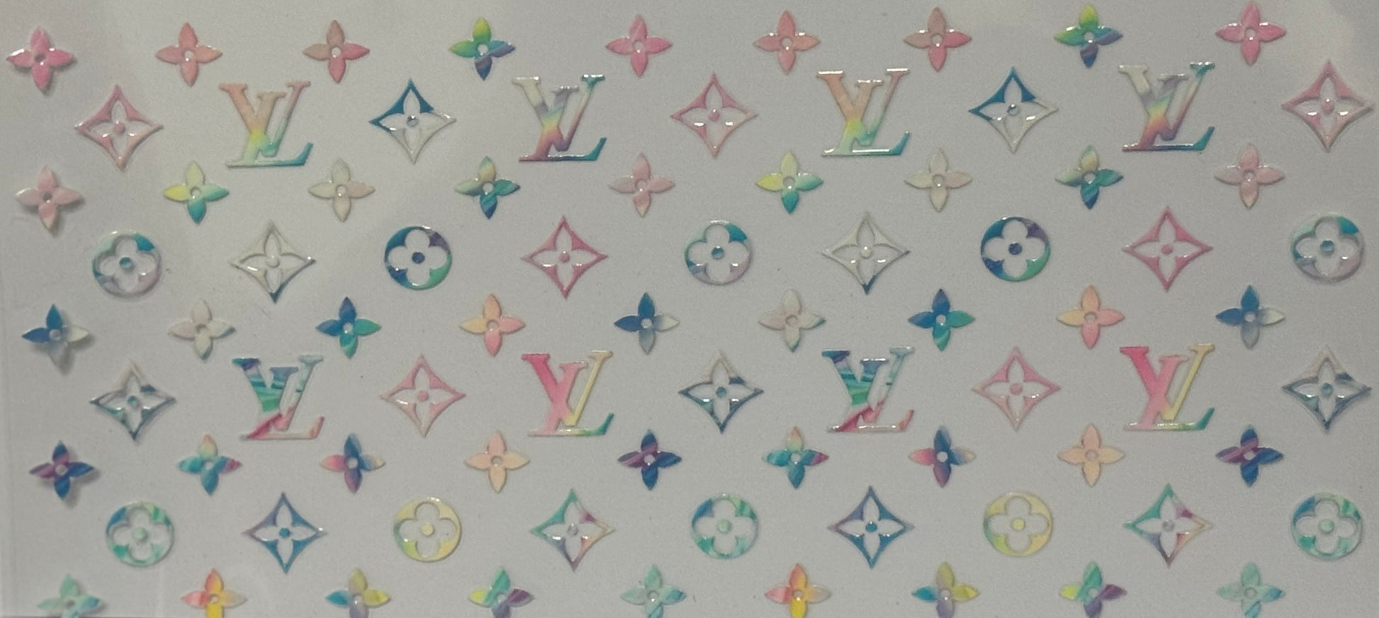 A pattern of pastel rainbow LV monogram-style shapes arranged across a light background.