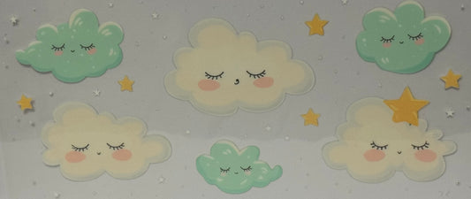 Cartoon pastel clouds with closed eyes and rosy cheeks surrounded by golden stars on a grey background.