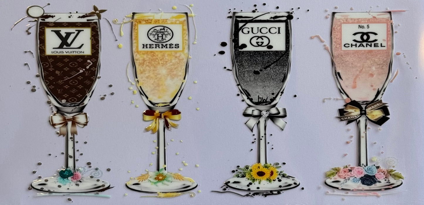 DTF wrap with champagne glasses and designer logos Louis Vuitton, Chanel, Gucci, and Hermès, sized 24x11cm.