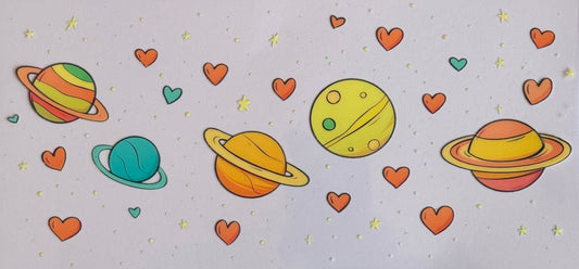 DTF wrap with colorful planets, red hearts, and stars in a cartoon style.