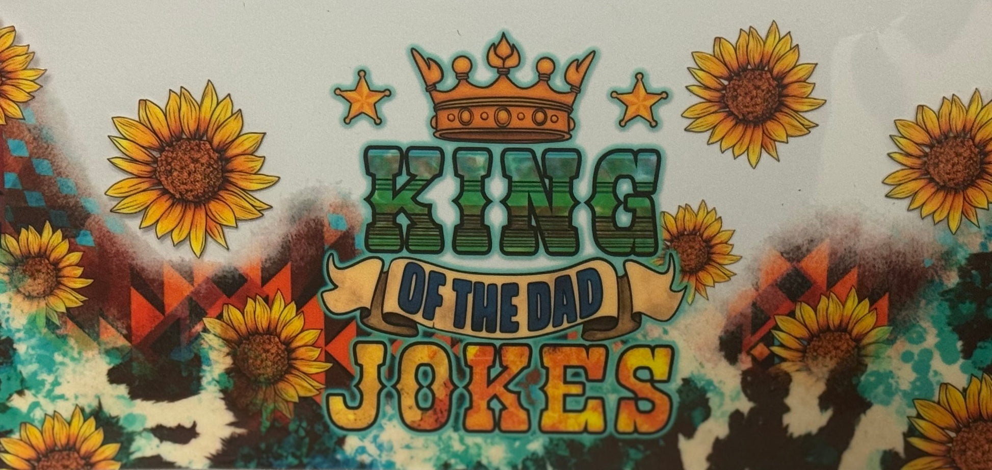 A wrap design with sunflowers, a golden crown, and bold text reading “King of the Dad Jokes.”