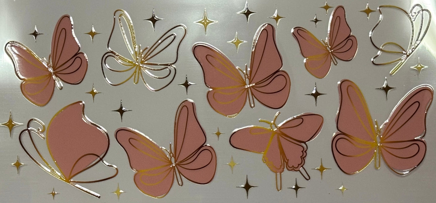 Pink butterflies outlined with gold surrounded by small golden stars on a clear background.