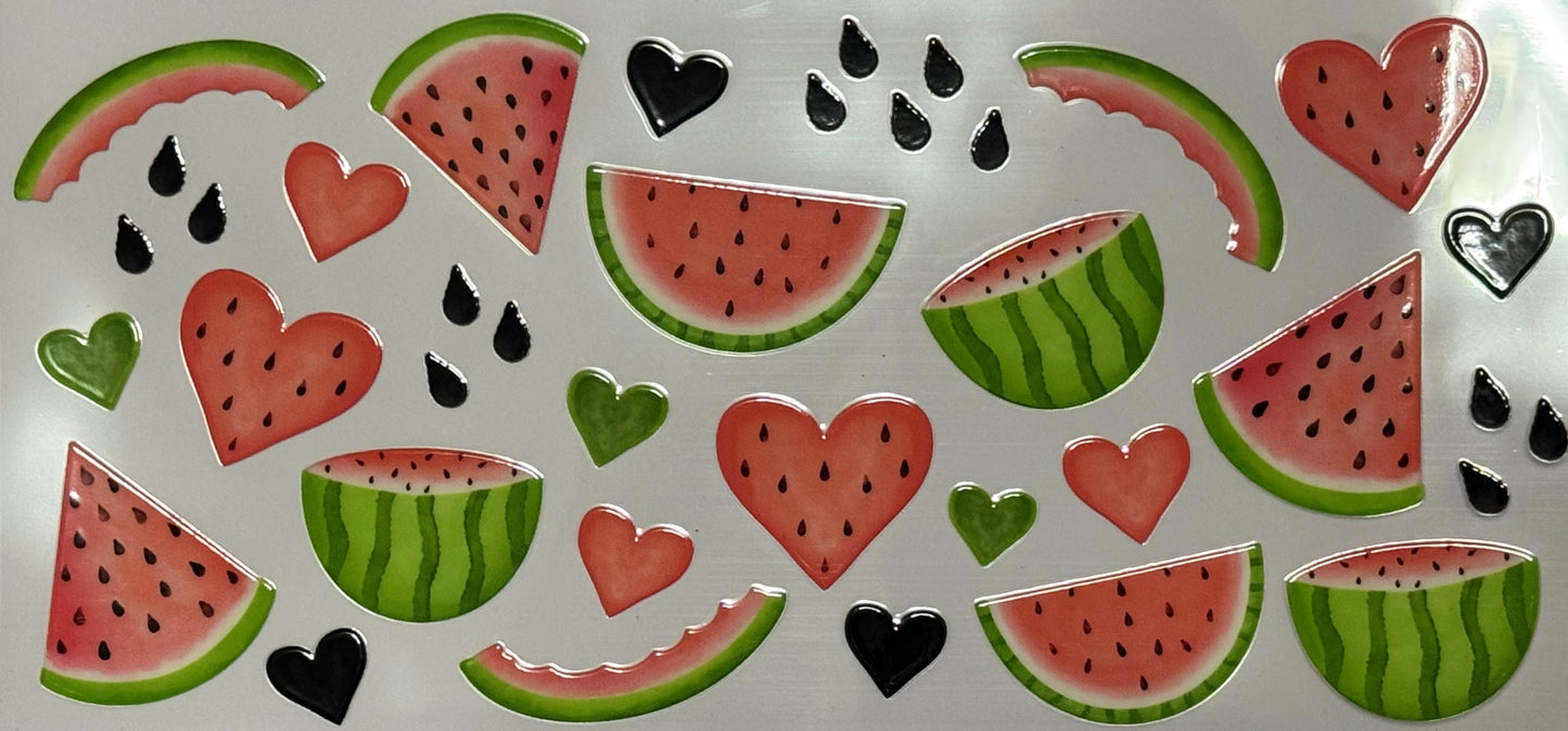 Watermelon slices, half melons, black seeds, and heart-shaped fruit pieces in red and green.