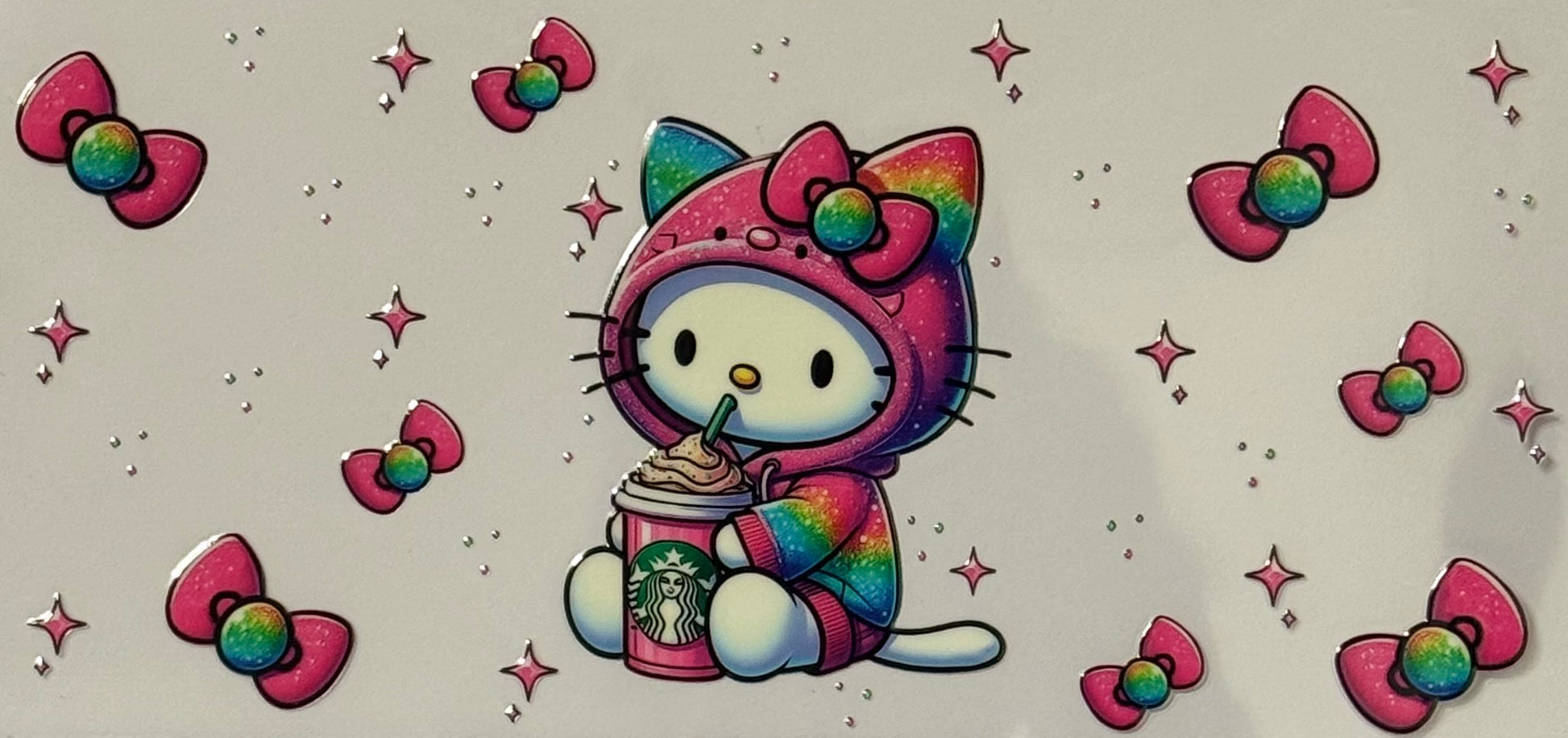 Hello Kitty in a rainbow hoodie holding a Starbucks drink surrounded by bows and sparkles.
