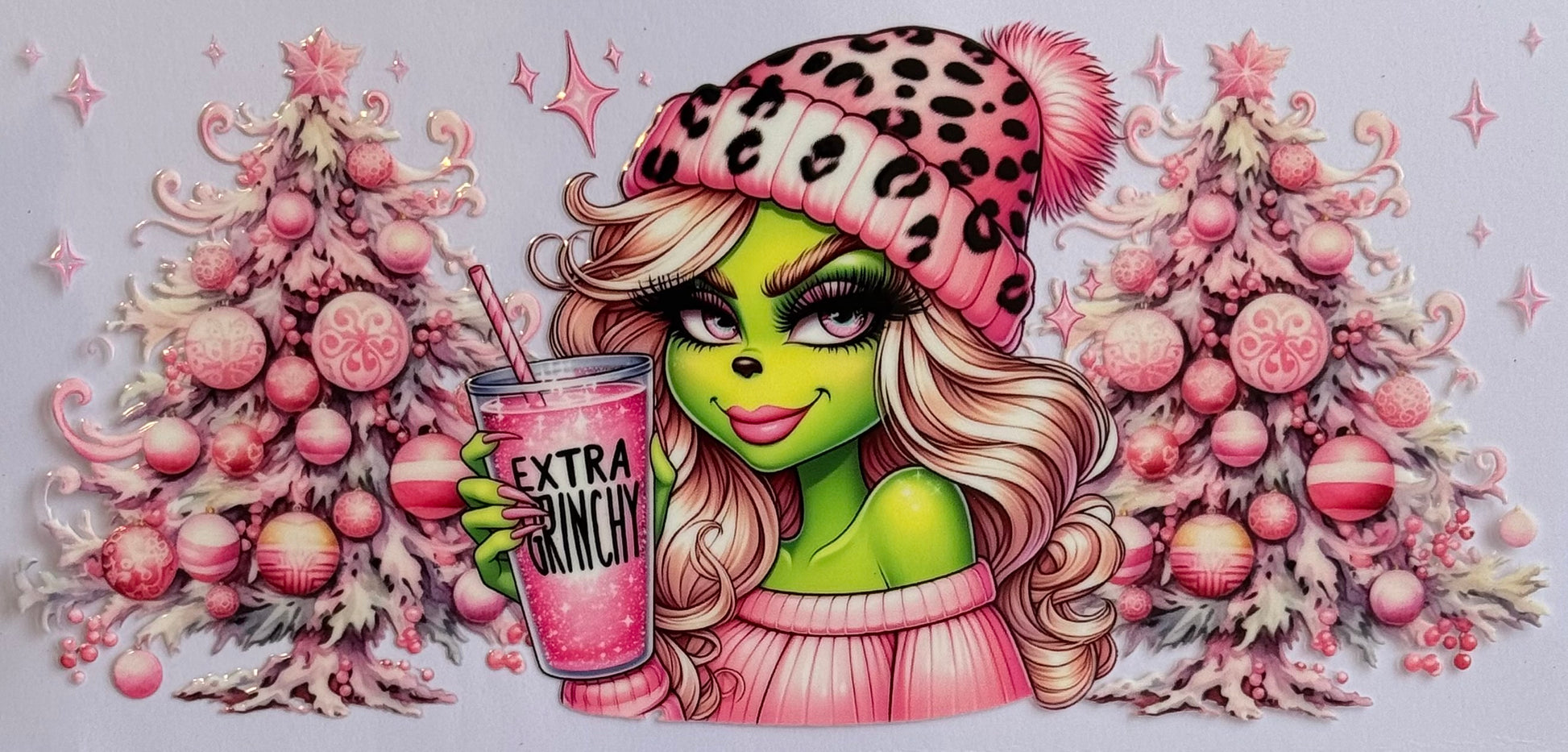 Female Grinch DTF wrap with festive outfit, bold colors, and holiday design, sized 24x11cm for 16oz tumblers.